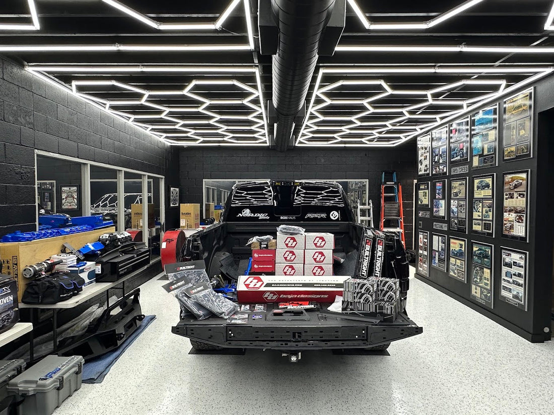 Hexagon LED ceiling lighting over a truck in an off-road shop in Glendora CA