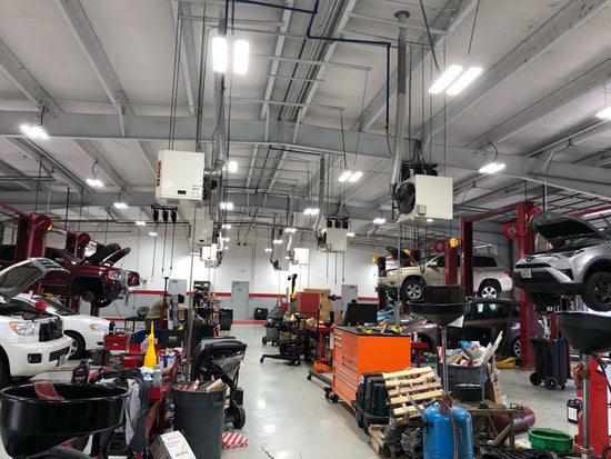 Auto service center in Corsicana TX lit with 160W LED linear high bay lights